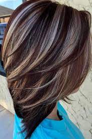 Streaked Chocolate Brown Hair With Contrasting Platinum Blonde Highlights Shoulder Length And Layered Seen From One S Haarfarben Haarschnitt Haarschnitt Bob