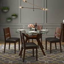 The best option for you is an oval table. Glass Dining Table Sets Buy Glass Top Dining Tables Online In India Urban Ladder