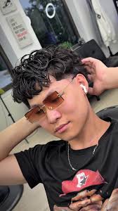 Textured Haircut Transformation with Low Taper