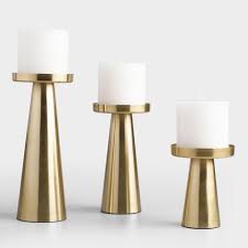 Save to favoritesknurled gold tea light candle holder. Brushed Gold Metal Contemporary Pillar Candleholder By World Market In 2021 Candle Holders Candle Decor Gold Candle Holders