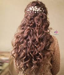 It keeps your hair away from your face and prevents you from the hassles of managing your hair swept away by the summer breeze. These Open Hairstyles For Bridal Hairdo Will Make You Ditch Buns