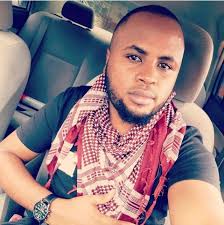 A Festo Lang photo of a photographer photographing me photographing Liz  Madowo photographing her food. Inception