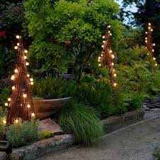 Charming Garden Obelisks And Ideas For Spectacular Garden Designs Garden Obelisk Willow Garden Garden Trellis