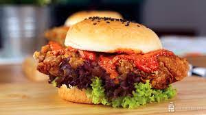 Regular batter is replaced with a special shrimp paste batter, so that the wing packs a punch full of flavour. Prawn Paste Chicken Burger Share Food Singapore