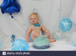 Maybe you would like to learn more about one of these? Baby S First Birthday Party Decoration With A Large Balloon And Small White And Blue Balloons Against A Blue Wall With White Clouds A Little Boy Stock Photo Alamy