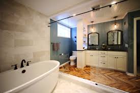 Brown rustic wet room with hydrotherapy bed. Beachy Coastal Bath Gallery Lake To Lake Construction