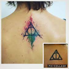 Deathly Hollows Watercolor Sketch Tattoo By Dn Alves Harry Potter Reliquias Da Morte Daniel R Alves Tattoo Artist Tattoo Sketches Tattoos Book Tattoo