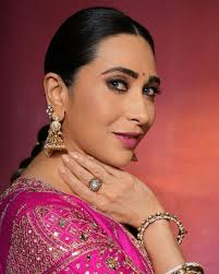 Karisma Kapoor, one of Bollywood's most graceful and elegant actresses,  never fails to impress with her style. When she wears traditional Indian  attire, she brings a perfect blend of royalty and simplicity.