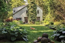 A Colonial Era Residence In Bedford New York Becomes A Tranquil Retreat Landscaping Around House Landscaping Around Deck Beautiful Outdoor Spaces