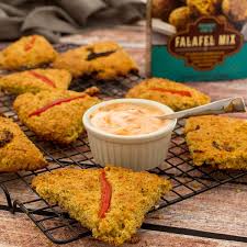 Trader Joe S Falafel Mix Is A Traditional Mediterranean Recipe Of Ground Fava Beans Chickpeas And Spices That S Chock Full Of Flav Recipes Falafel Mix Falafel