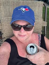 Wearing a hat, possibly in Canada