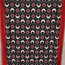 The coveted telia rumal hand woven ikat saree. Pochampally Handloom Double Ikat Telia Rumal Sun Moon Motif Silk Saree