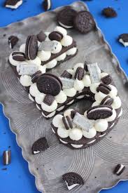 Bright white candy melts candy; Modern Number Cakes Alphabet Cake Desserts Number Cakes