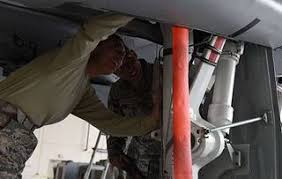 Airman 1st Class Christa Tamez, left, and Airman Wilson