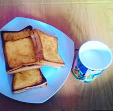 Roti bakar (grilled bread) is an indonesian street snack that consists of multi layered bread that is served toasted and often with butter, cheese (keju), ma. Sarapan Dengan Roti Bakar N Minum Segelas Susu Hangat Flickr