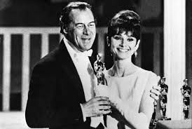 rex harrison actor my fair lady with presenter audrey hepburn onstage at the 1964 37th academy awards my fair lady woman standing audrey hepburn