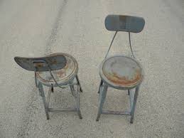 Nice vintage condition original paint, heavy duty steel legs. Pair Of Industrial Machine Age Vintage Metal Studio Loft Or Factory Shop Stools