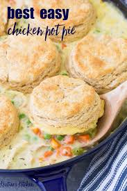 Homemade Chicken Pot Pie With Biscuits Tender Chicken And Vegetables In A Creamy Sauce Wi Homemade Chicken Pot Pie Chicken Pot Pie Recipes Pot Pie Recipe Easy