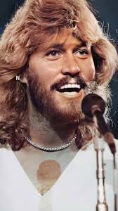 Travis Gibb (son of Barry Gibb) with wife Stacy Bash Gibb, and their two  children Layla and Liam Gibb