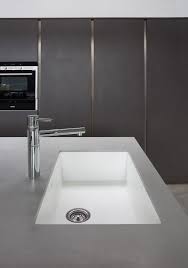 Sink Tap Surrounded With Dove Grey Corian Grey Countertops White Kitchen Worktop Kitchen Worktop