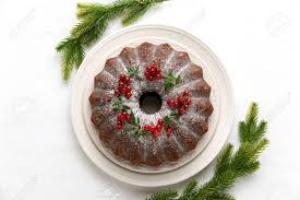 Christmas bundt cake decorating ideas. Christmas Bundt Cake Served On White Wooden Table And Decorated With Fresh Cranberries Christmas Baking Concept Or Idea Overhead View Stock Photo Picture And Royalty Free Image Image 132009227