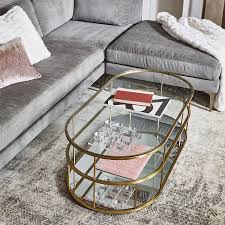 Solid wood frame with antiqued bronze finish. Terrace Pill Coffee Table Coffee Table Coffee Table Wood Display Coffee Table