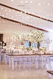 Everyone dreams of their fairytale wedding, and when the big day comes, everything needs to be. Silver White Green Wedding With Raw Wooden Tables Silver Candelabras Antique Silver Deco White Wedding Decorations Wedding Decor Elegant Candelabra Wedding