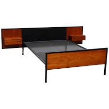 The headboard has built in lights that are working. Mid Century Bed And Nightstands 1stdibs