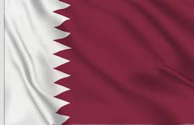 The qatar flag is a white band on the left, separated from a maroon area on the left by nine white historically, the national flag of qatar was plain red in color and based on the banner used by the. Qatar Flag