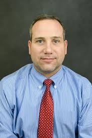 Four faculty and staff...