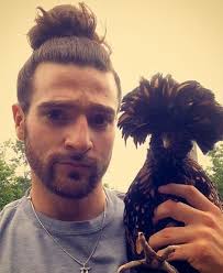 Curl hair, put in bun hair spry it take some curls out of the sides and if you know how to do a bun in it will be easier first take half of your hair then make a bun then tie it then holding the hair tightly, put it in a bun. Man Bun And Top Knot Hairstyles Faq Guide Man Bun Hairstyle