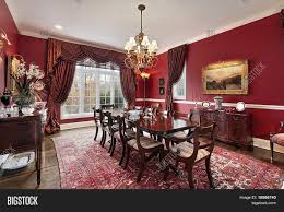 The general rule of thumb for hanging dining room fixtures is 30 to 36 inches off the surface of the table. Formal Dining Room Image Photo Free Trial Bigstock