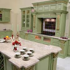 Green accents come in cottage pieces: Best Alternatives To White Kitchen Cabinets Paintzen
