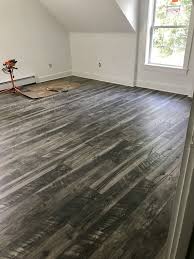 Laminate flooring gives you the look of hardwood, tile or stone floors in addition to exceptional durability, easy installation and low maintenance. Cinderwood Fusion Laminate Unique Flooring Laminate Flooring Home Depot Flooring