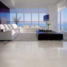 Floor tiles are a product loaded with versatility and design work with features and finishes that make them a key material for use as flooring in all kinds of spaces. Large Shiny Floor Tiles Tile Floor Living Room Modern Floor Tiles White Tile Floor