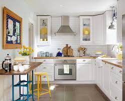Make A Small Kitchen Look Larger With These Clever Design Tricks Kitchen Remodel Small Kitchen Design Small Kitchen