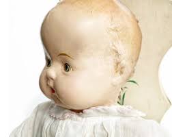 Muñeca de composición vintage: cuerpo de tela de los años 30, ojos de sueño  (48 cm)