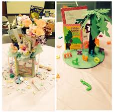 See more ideas about baby shower, baby shower themes, baby shower book. Book Themed Baby Shower Table Centerpieces One On Left Is Inspire By Childre Boy Baby Shower Centerpieces Baby Shower Table Centerpieces Storybook Baby Shower