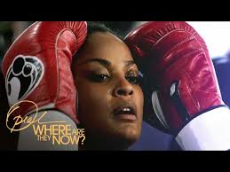 Who Inspired Muhammad Ali's Daughter to Start Boxing?