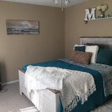 *ring pull hardware in an antique brass color, accented with white paint hang up. Willowton Queen Panel Bed Ashley Furniture Homestore