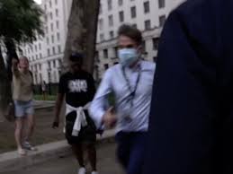 Footage shows the journalist being called a 'traitor' and 'scum', and running to safety behind the gates of downing street. 6 0d7lu 1lgghm