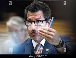 Thomas Binger, assistant district attorney, talks about the videos where  Rittenhouse can be seen discharging his firearm