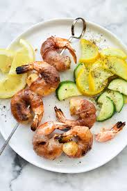 Grill shrimp for 2 minutes per side, until pink and fully cooked. Prosciutto Wrapped Grilled Shrimp Skewers Foodiecrush Com