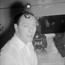 Image of Jerry Lewis providing White House Photographer, Abbie Rowe, with a