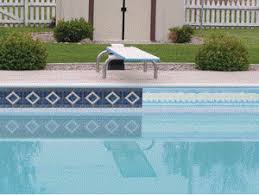 Vinyl tiles are a popular choice for people on a budget. Borderlines Vinyl Liner Tile Borders Intheswim Pool Blog