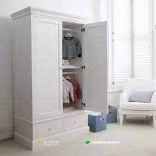 Lemari pakaian anak minimalis kayu jepara model desain 2 pintu laci warna putih cat duco mewah modern klasik terbaru harga murah yang cocok sekali untuk furniture ruang tidur atau kamar dengan almari baju kualitas terbaik. Lemari Pakaian 2 Pintu Warna Putih Minimalis Home Furniture Jepara