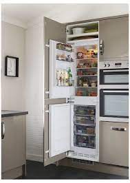 Stacks of drawers with classic brass bin pulls offer variety in storage. Clh Digi Det A00052 Integrated Fridge Freezer Cabinet Integratedfridgefreezercabi In 2021 Kitchen Furniture Design Integrated Kitchen Appliances Integrated Fridge