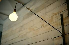 Is Jean Prouve S Potence Lamp The Lighting Equivalent Of The Little Black Dress It S A Timeless Classic That Instantl Swing Arm Lamp Lamp Powder Room Lighting