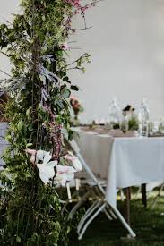 Draw inspiration for simple, casual & organic decor for your thanksgiving or friendsgiving dinner party from my friendsgiving 2015 dinner party. Backyard Rehearsal Dinner Party Rehearsal Dinner Ideas And Decorations Rehearsal Ideas Rehearsal Dinner Centerpiece Garden Tablescape White Table With Greenery7 The Anastasia Co