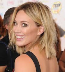 Once hair is dry, make a deep side part and push your front layers to the side. Hillary Matthews 248px Image 10 Hilary Duff Hair Hillary Duff Hair Hair Styles